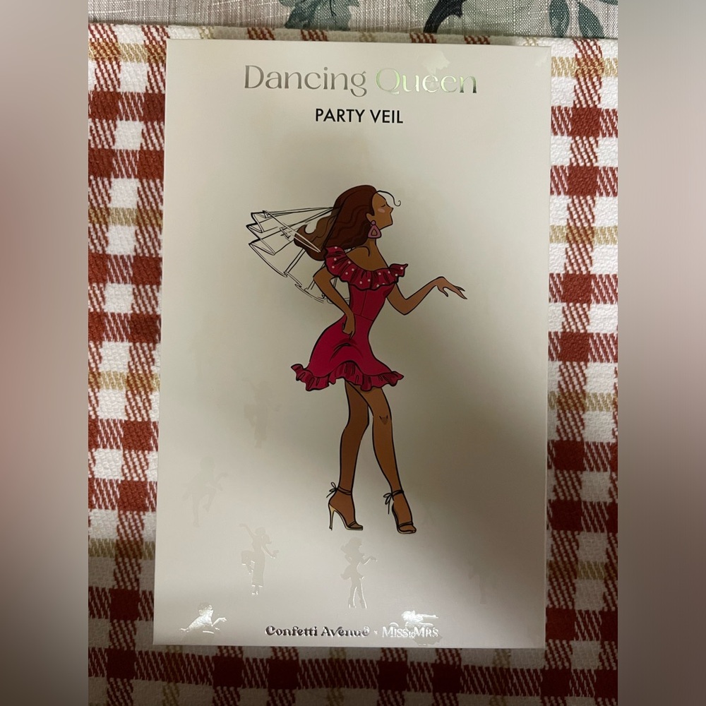 BRAND NEW NEVER USED OR OPENED. BRIDAL PARTY VEIL.